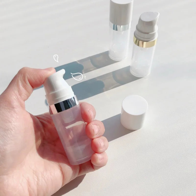 Travel Cosmetic Bottles with Pump - 5Pcs Vacuum Containers for Skincare Products"