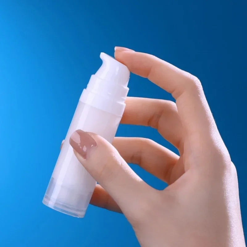 Travel Cosmetic Bottles with Pump - 5Pcs Vacuum Containers for Skincare Products"