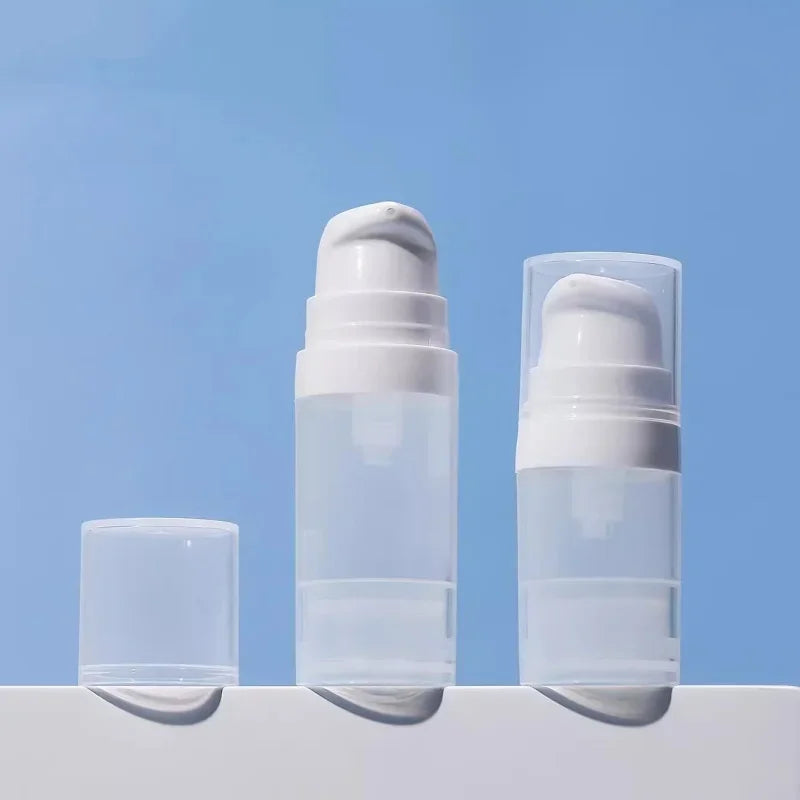 Travel Cosmetic Bottles with Pump - 5Pcs Vacuum Containers for Skincare Products"