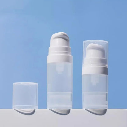 Travel Cosmetic Bottles with Pump - 5Pcs Vacuum Containers for Skincare Products"