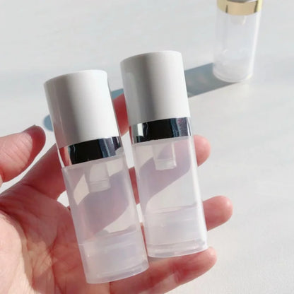 Travel Cosmetic Bottles with Pump - 5Pcs Vacuum Containers for Skincare Products"